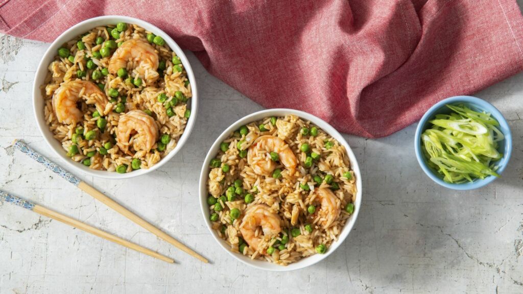 Shrimp fried rice bowl topped with green onion