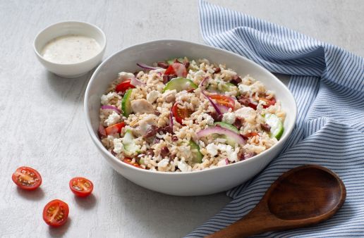 chicken-and-rice-salad-with-caesar-dressing-cherry-tomatoes-olives-red-onion-and-cucumber