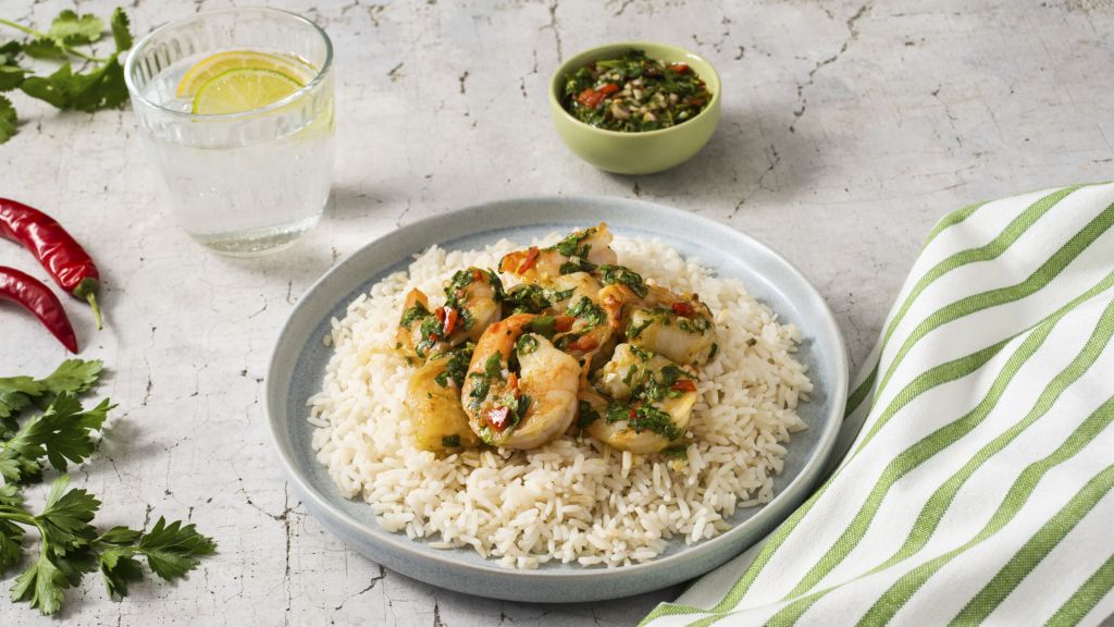 white-rice-bowl-topped-with-shrimp-and-chimichurri-sauce