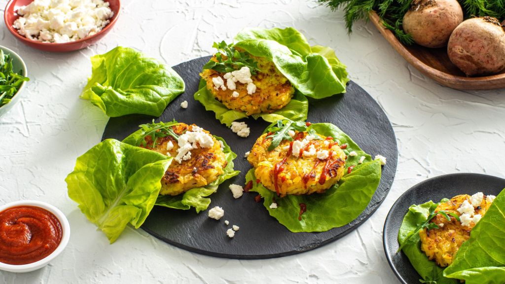 golden-beets-and-jasmine-rice-burger-sliders-served-over-lettuce-leaves