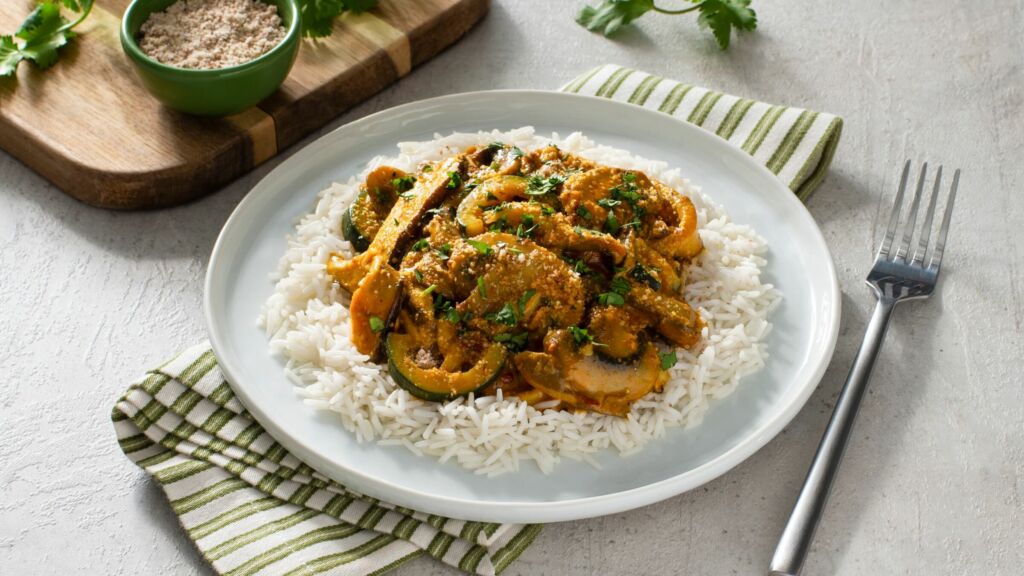 mushroom-korma-served-over-basmati-rice