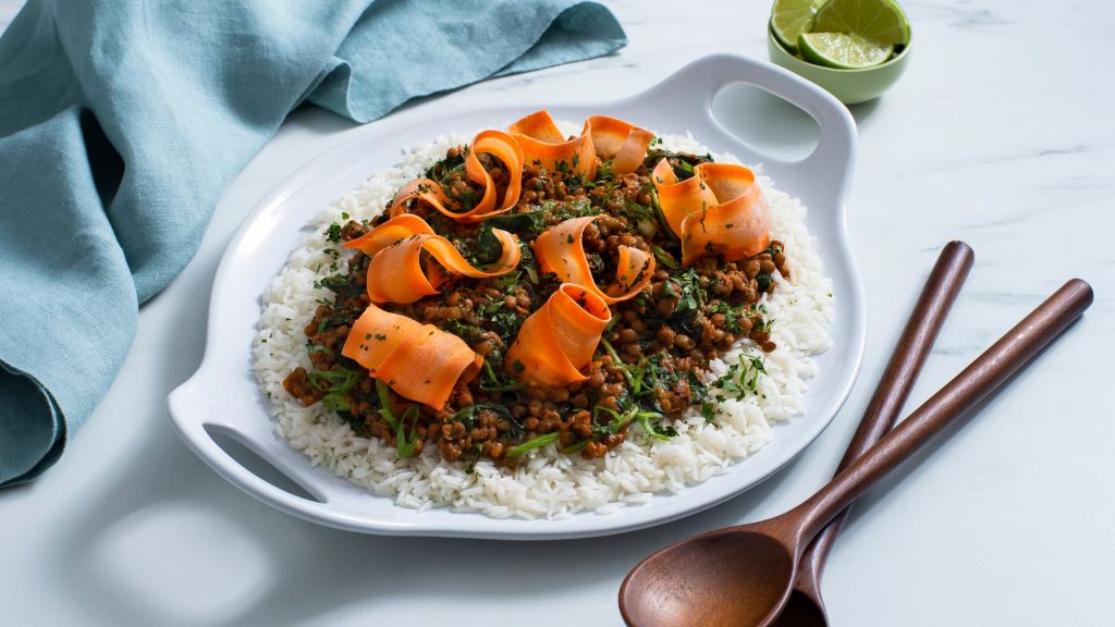 thai-lentil-salad-with-carrots-baby-spinach-and-curry-paste-served-over-jasmine-rice