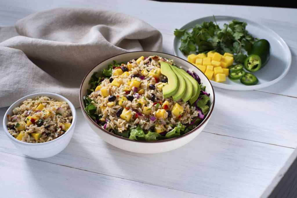 rice-salad-bowl-with-mango-black-beans-rice-corn-bell-peppers-salad-greens-and-avocado