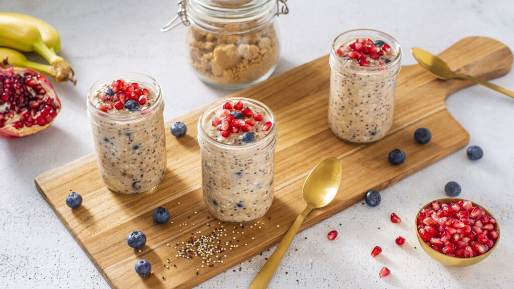 quinoa-overnight-oats-with-almond-milk-bananas-blueberries-and-pomegranate-seeds