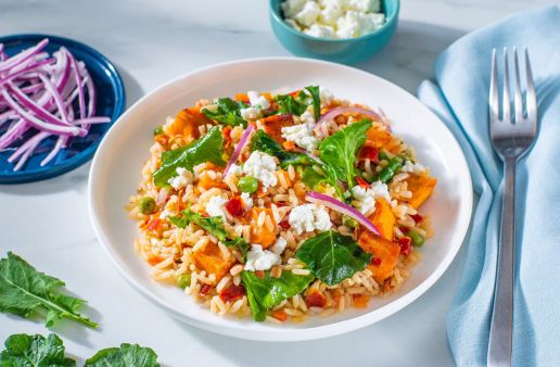 sweet-and-spicy-harvest-vegetables-and-rice-with-kale-red-onion-sweet-potatoes-and-crumbled-goat-cheese
