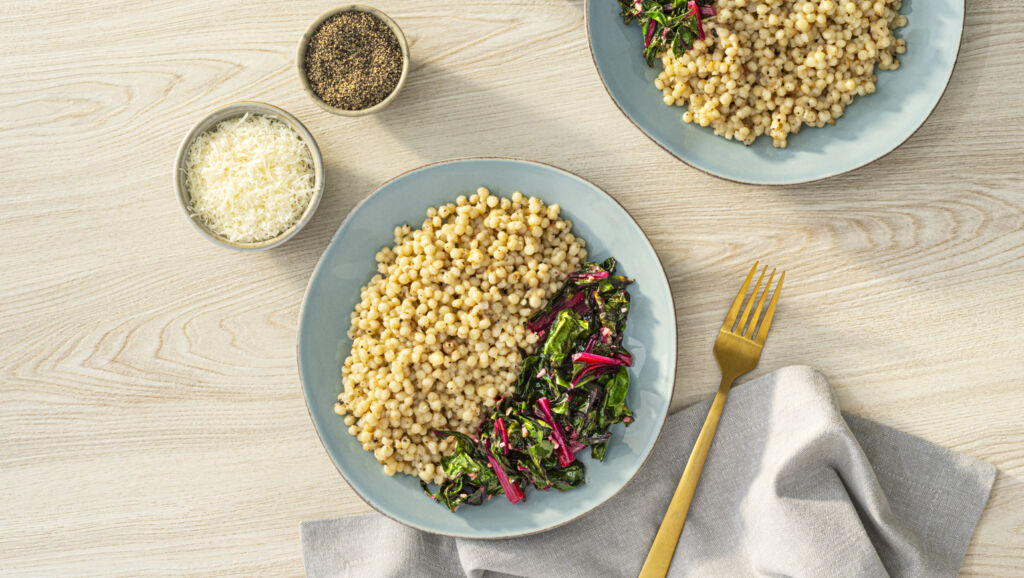 Cacio e Pepe Pearl Couscous with Sauteed Swiss Chard